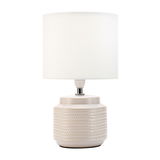 Lampe de table en céramique beige avec abat-jour en tissu blanc et motif décoratif pour éclairage intérieur