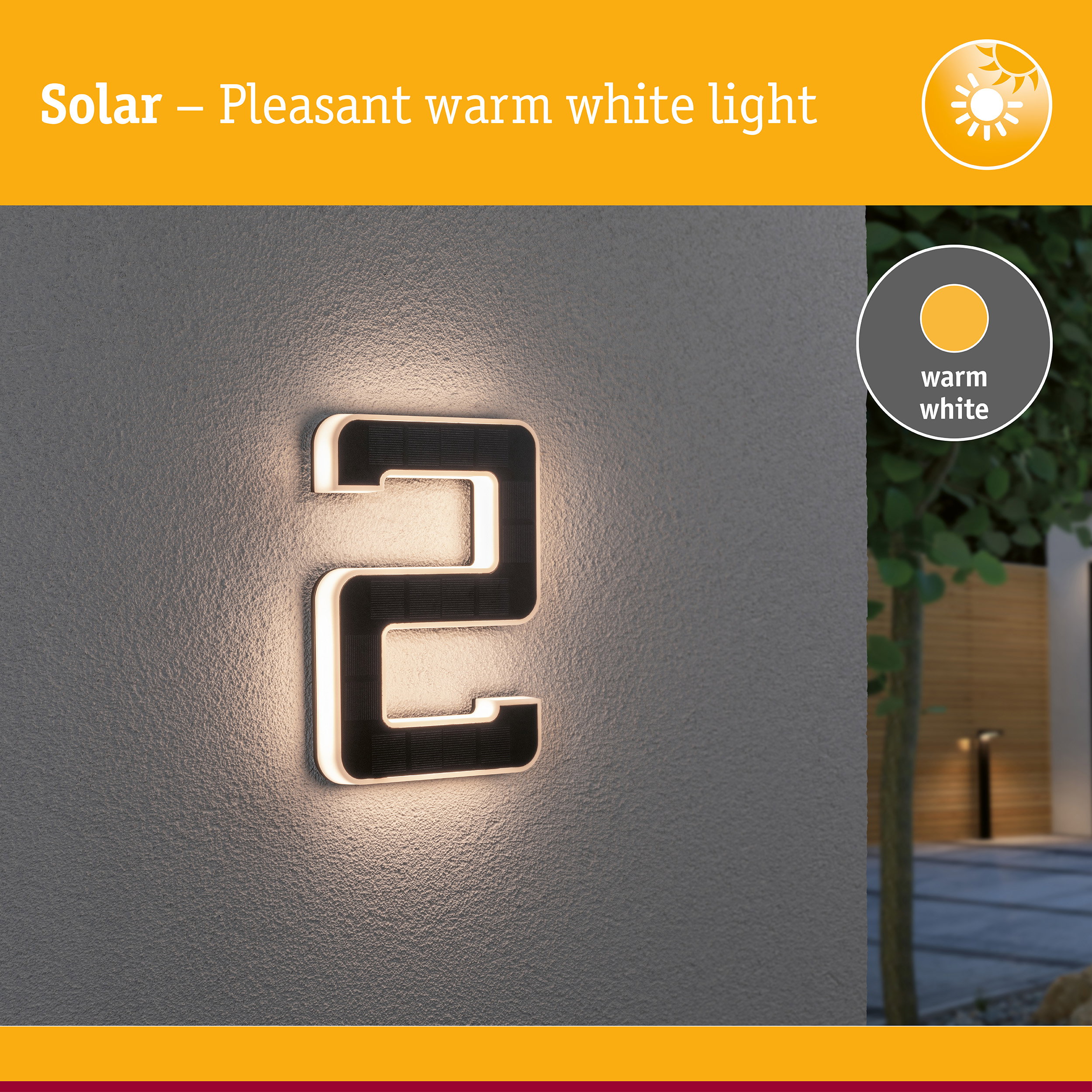 Solar-powered house number with warm white light mounted on grey wall for outdoor lighting