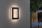 Rechteckige Solar-Wandleuchte in Schwarz mit warmweißem LED-Licht für Außenbereiche und Gartenbeleuchtung.