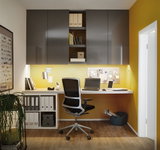 Bureau moderne avec armoires murales grises, mur jaune, chaise de bureau ergonomique et éclairage LED