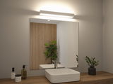 Modern bathroom with white ceramic sink, wooden countertop and white LED mirror light for bright illumination