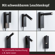 Schwarze LED-Wandleuchte mit schwenkbarem Leuchtenkopf für gezielte Beleuchtung beim Lesen