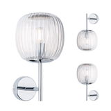 Wall light with ribbed clear glass and chrome metal, modern indoor lighting fixture design.