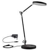 Modern black LED desk lamp with round light head and dimmable touch switch made of metal.