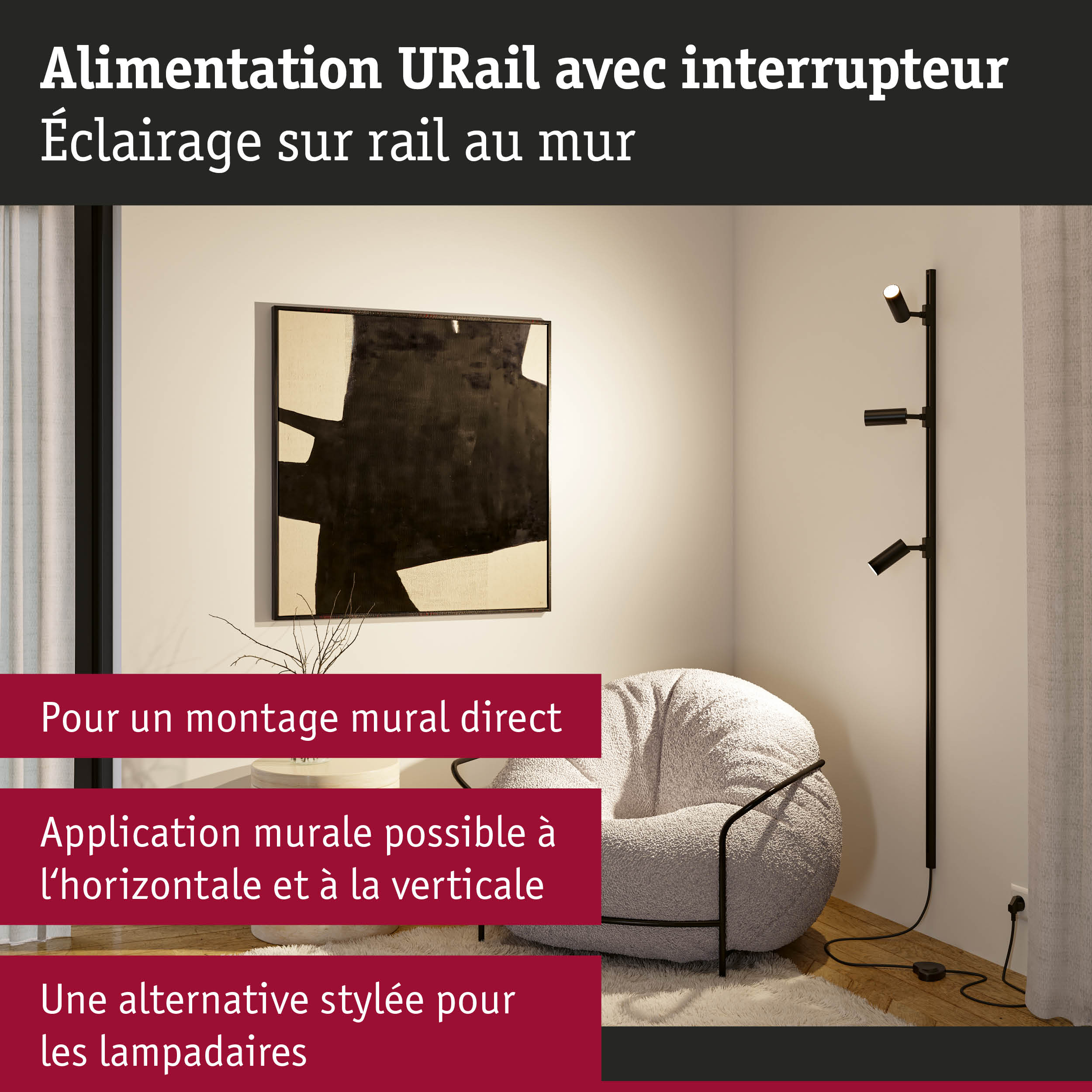 Spots noirs URail avec interrupteur sur rail fixés au mur dans un salon moderne avec tableau et fauteuil