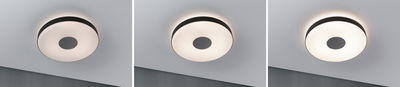 Three round ceiling lights with black rim and white diffuser, dimmable LED lighting in modern room setting.