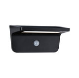 Black metal LED outdoor wall light with motion sensor for energy-efficient garden lighting