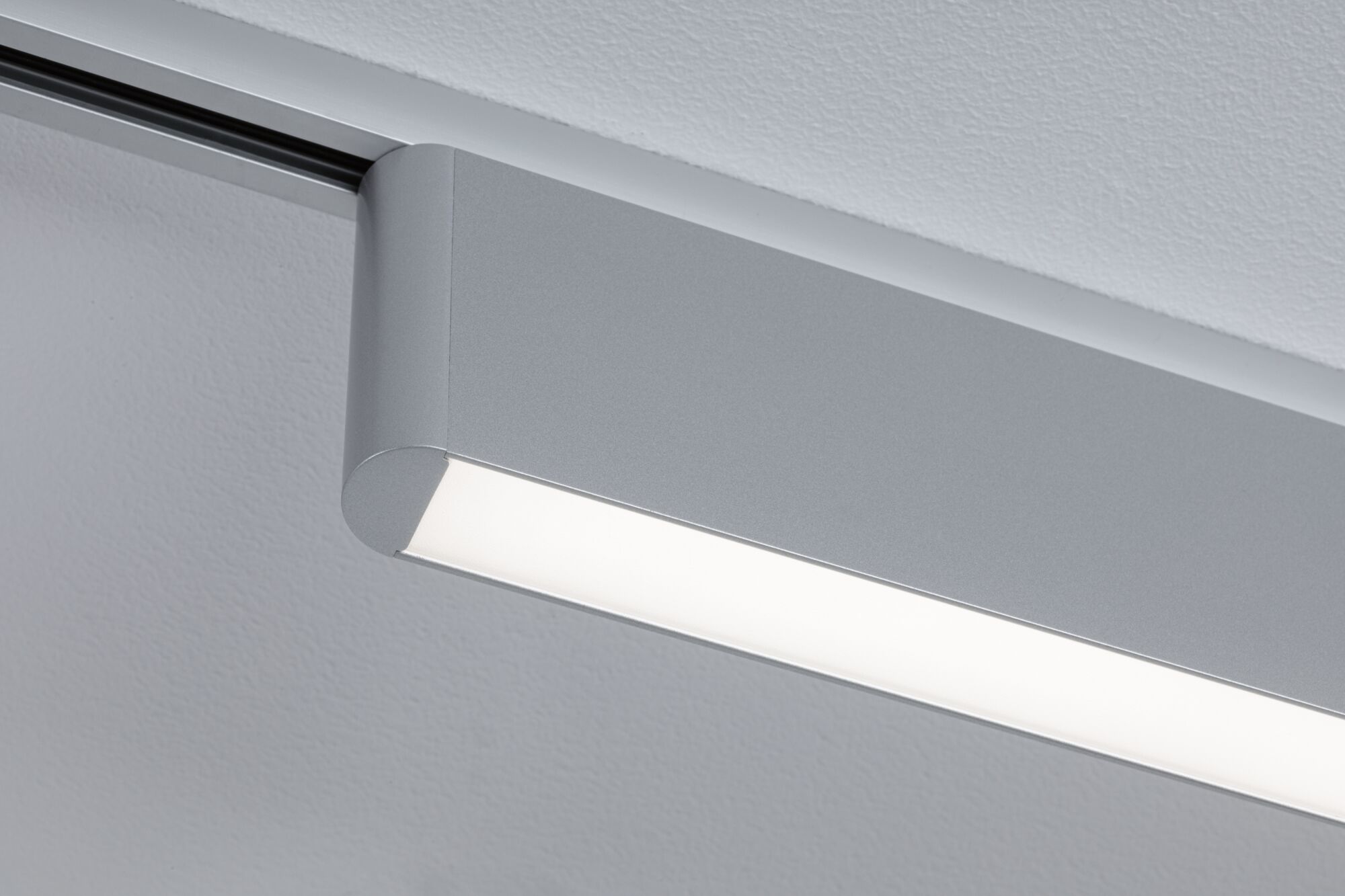 Modern silver aluminium LED ceiling light with diffused illumination for living spaces
