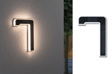 Modern black LED wall light with indirect warm white illumination for outdoor use