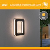 Solarbetriebene Wandlampe mit warmweißem Licht und schwarzem Rahmen für Außenbereiche