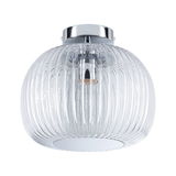 Ceiling light with ribbed clear glass and chrome metal in a modern lighting design