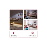 Wit kinderbed met LED-nachtverlichting onder het frame, activeert bij minder dan 20 Lux licht.