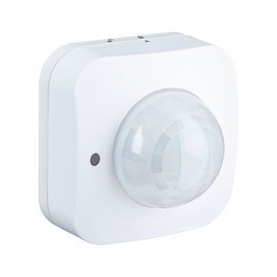 White motion sensor with spherical plastic lens for smart lighting control
