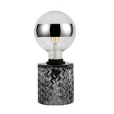 Moderne tafellamp met zilveren lamp en gestructureerde grijze glazen voet voor sfeerverlichting