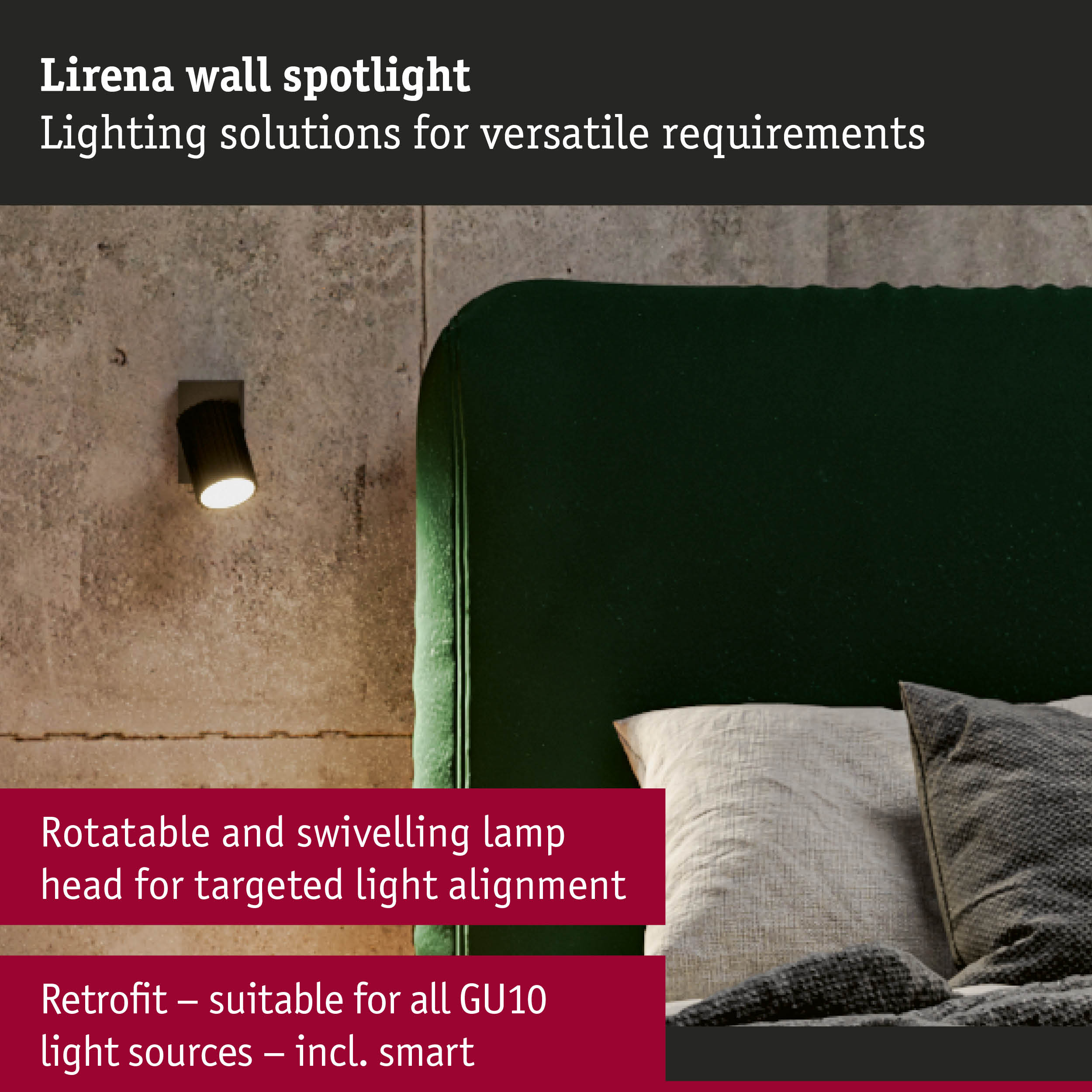 Black Lirena wall spotlight with rotatable, swivelling head on concrete wall beside green velvet sofa
