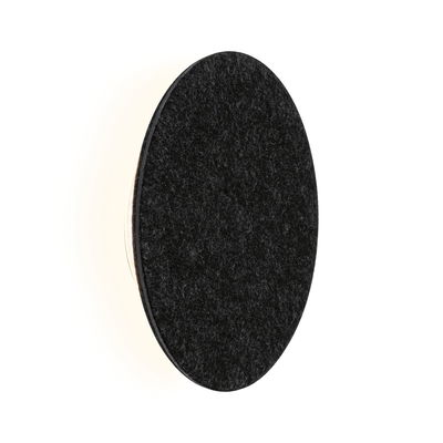 Round wall lamp with black felt cover and warm white LED light for modern living spaces