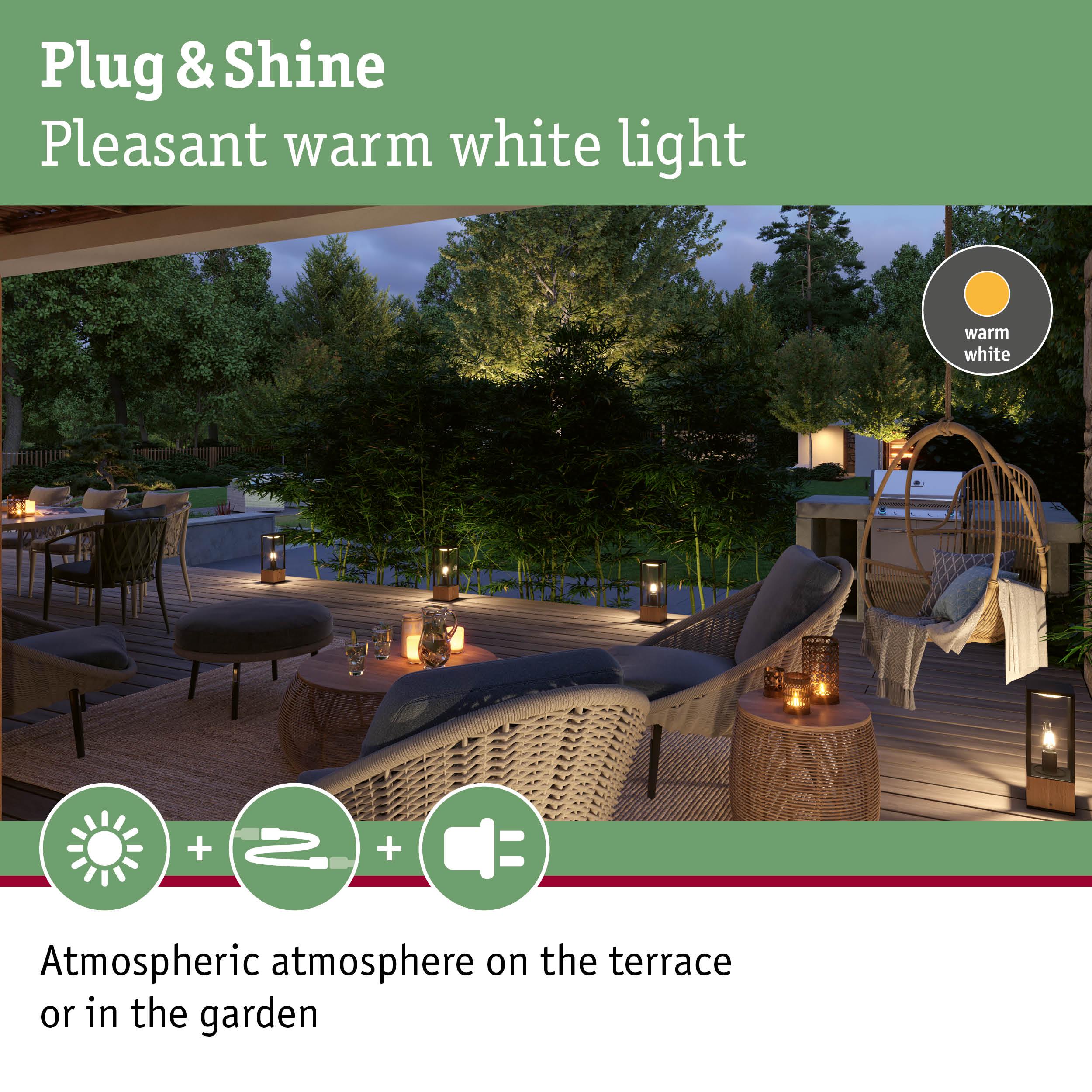 Cozy terrace illuminated by warm white Plug & Shine lights creating atmospheric garden lighting