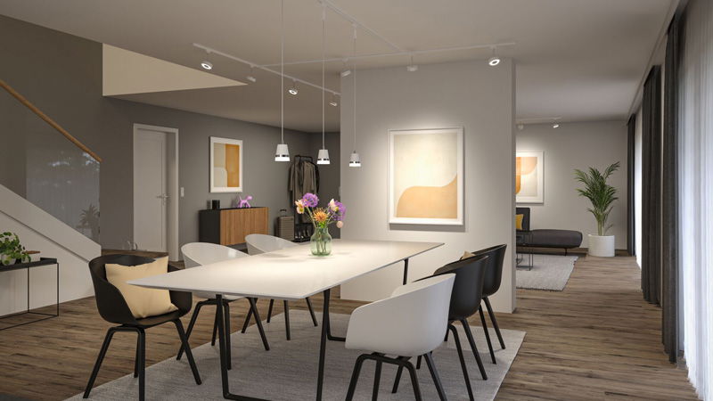 Modernes Wohnzimmer mit URail Schienensystem in Schwarz und warmweißen LED-Spots für flexible Beleuchtung.