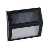 Black solar outdoor light with plastic housing and clear diffuser for energy-saving illumination