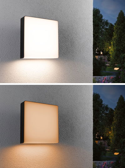 Square outdoor wall light with black frame emitting warm and cool white light for garden lighting