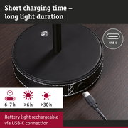 Black round rechargeable table lamp with USB-C port and long LED light duration for home lighting