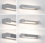 Modern grey aluminum wall light with adjustable shade and warm white LED light for living spaces.