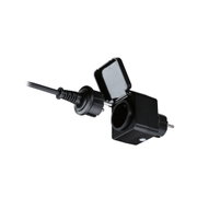 Black plastic socket adapter with hinged cover for secure indoor power connection and electrical safety