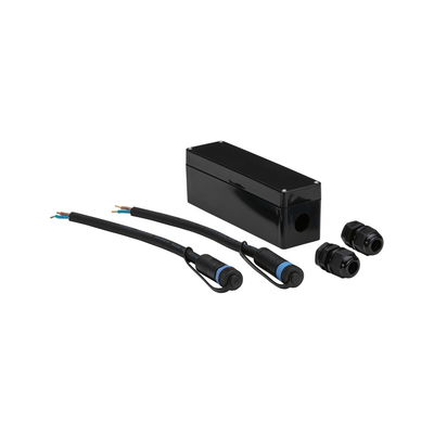 Black plastic connection box with cables and connectors for LED lighting systems