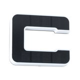 White and black C-shaped plastic device with solar panels for energy-saving lighting