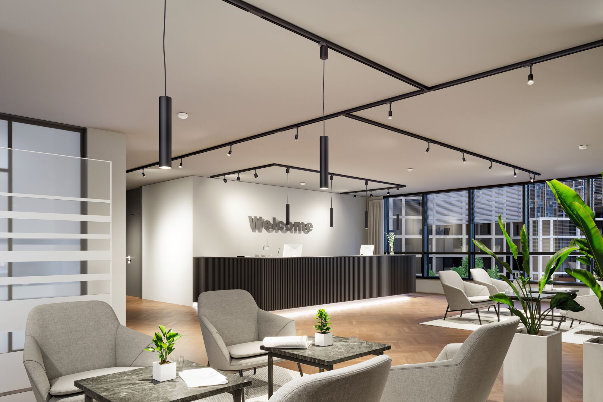 Modern reception area with black counter, grey armchairs, and LED track lighting in office space.