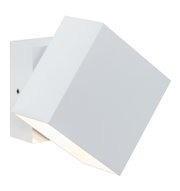 Modern white aluminum wall spotlight with angular design and warm white LED light for indoor use