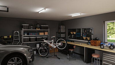 Moderne Werkstatt mit LED-Deckenleuchten, Fahrrad auf Ständer, Werkzeugwand und Werkbank mit Stauraum.