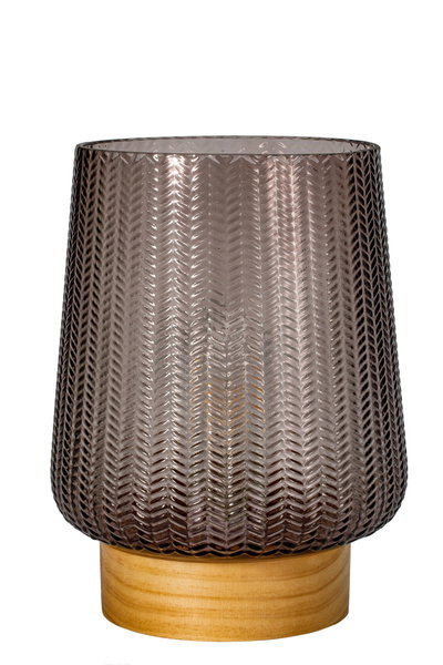 Braunes Glaswindlicht mit Muster auf hellem Holzsockel, dekorative Wohnaccessoire für stimmungsvolle Beleuchtung