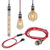 Vintage LED bulbs with red fabric cable and metal socket for decorative lighting solutions