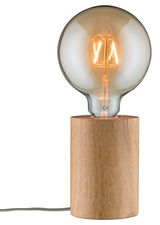 Table lamp with wooden base and large bulb emitting warm light for cozy lighting