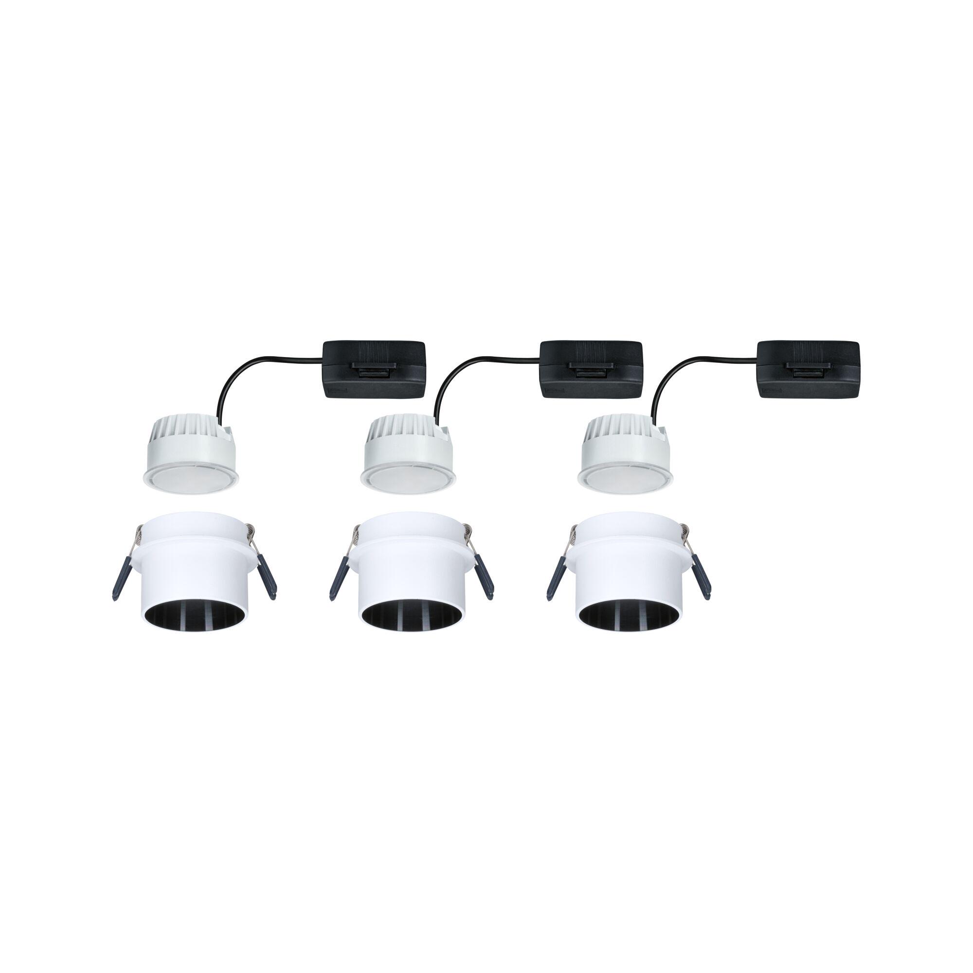 Set of three white plastic LED recessed spotlights with black wiring for modern indoor lighting