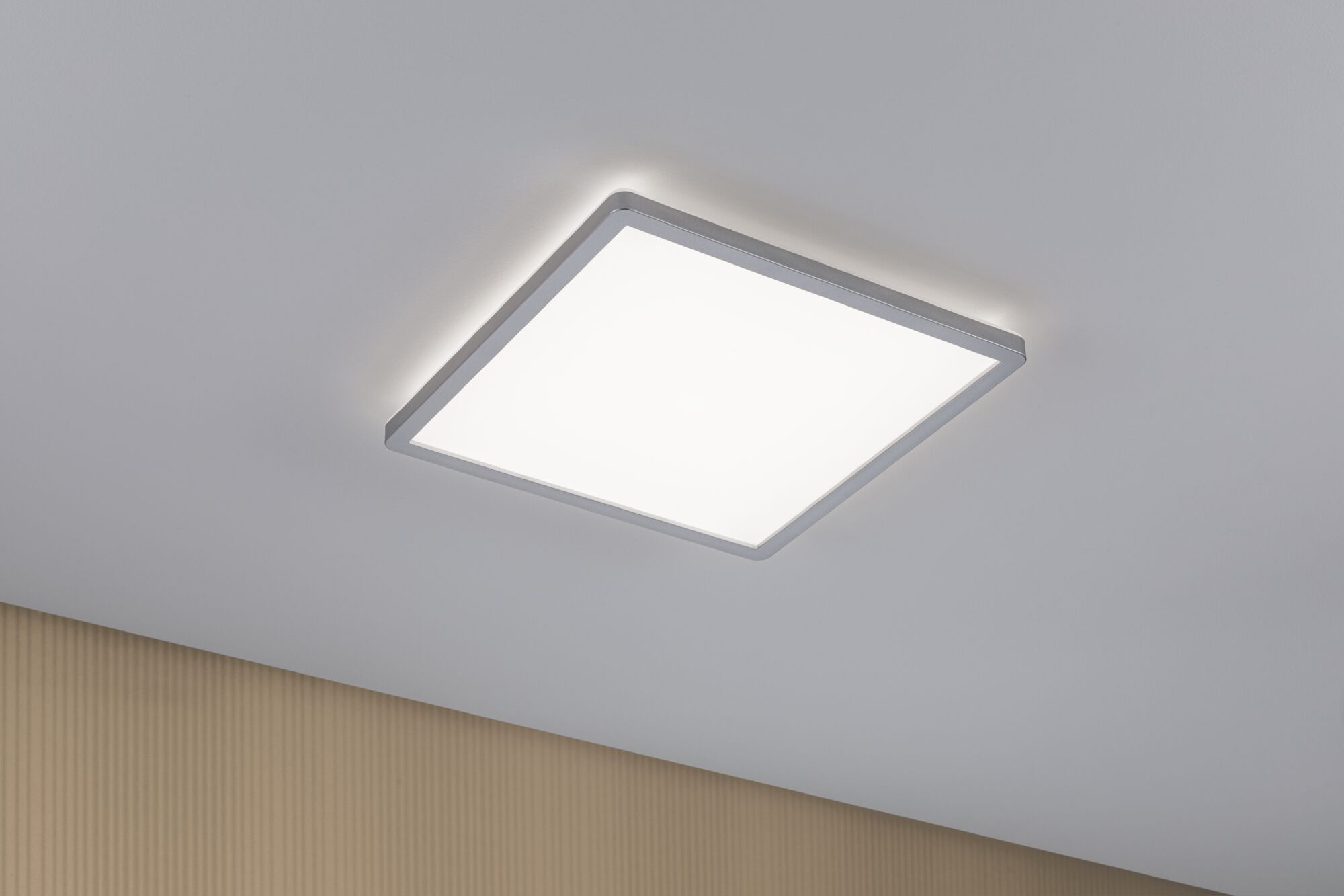 Modern square LED ceiling light with white plastic frame and warm white light for living spaces