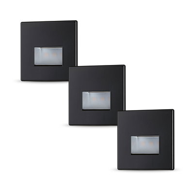 Three square matte black LED wall lights with diffused light opening for modern indoor lighting solutions.