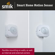 White smart home motion sensor with flexible mounting on walls and corners for home security