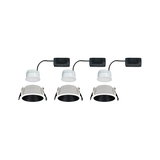 Three white LED recessed spotlights with black interior and black driver box for ceiling installation