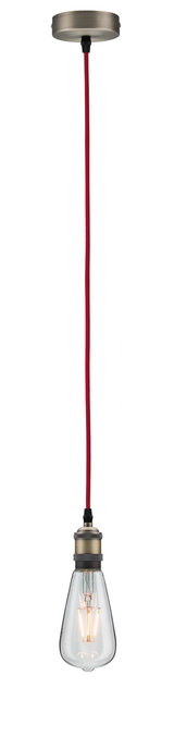 Pendant lamp with red fabric cable and antique brass metal socket featuring visible bulb