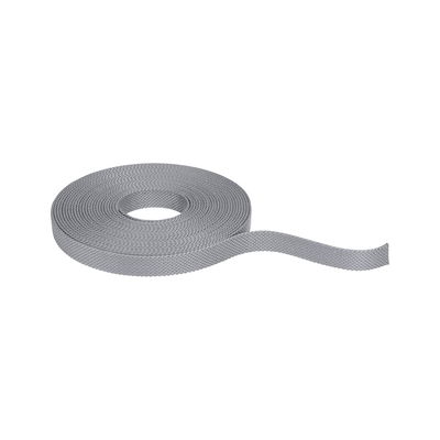 Grey textured textile tape rolled up, versatile for fastening and decorative uses in home projects