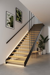 Modern staircase with wooden steps and black metal railing, LED lighting beneath each step