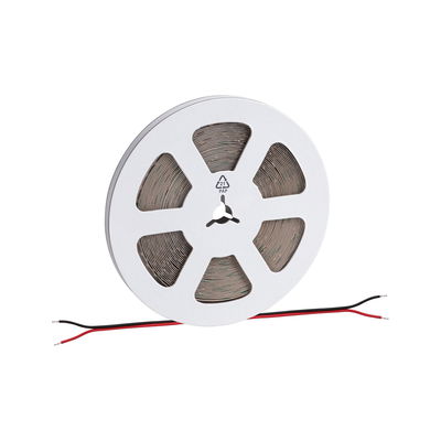 White cardboard reel with grey LED strip and red and black connection wires for LED lighting