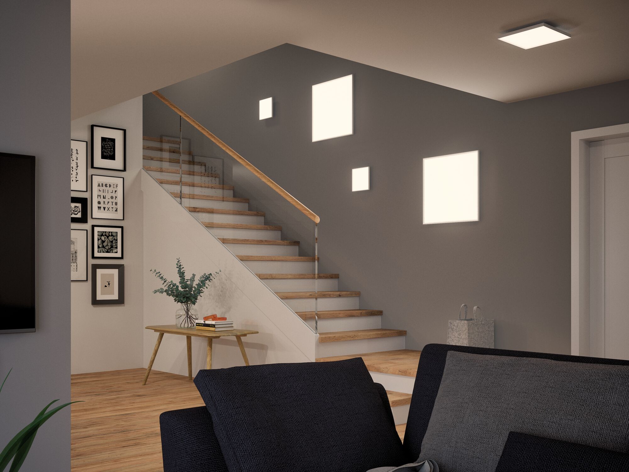 Modern living room with wooden staircase, grey wall and square LED ceiling and wall lights for ambient lighting