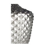 Close-up of a transparent textured glass lampshade with diamond-shaped pattern