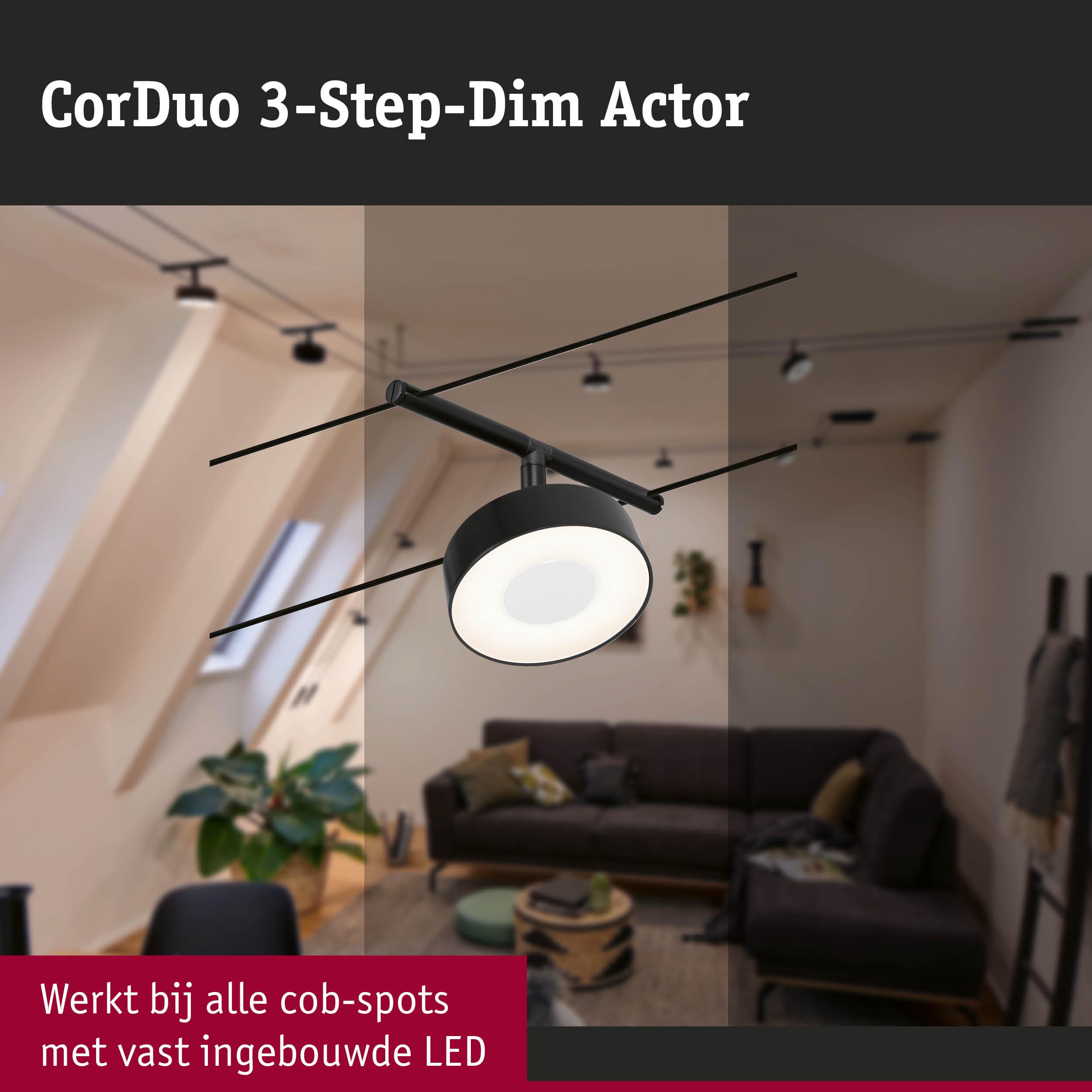 Zwarte CorDuo 3-staps dimbare LED-spot aan railsysteem in moderne woonkamer