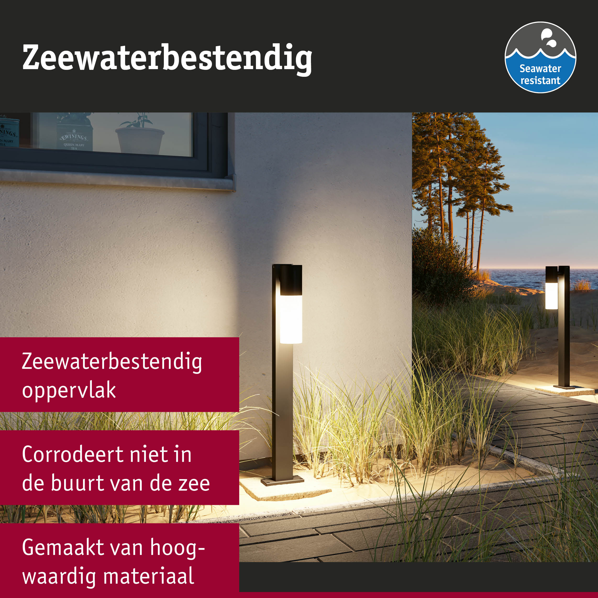 Zwarte buitenlamp met zeewaterbestendig materiaal en modern design langs het strandpad.