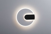 Runde LED-Wandleuchte in Weiß und Schwarz mit indirektem Licht für modernes Wohnambiente