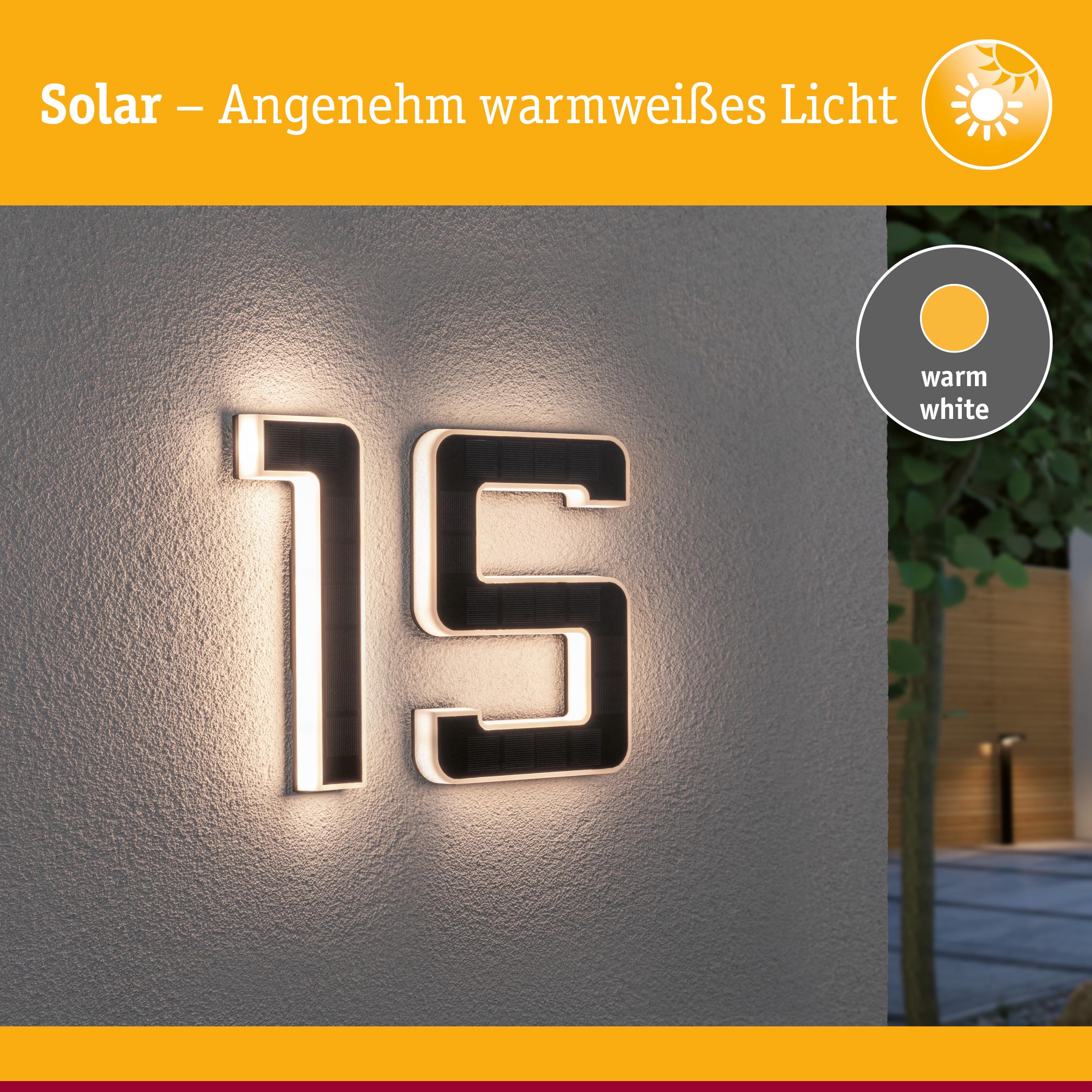 Solar beleuchtete Hausnummer 15 mit warmweißem Licht an grauer Wand für Außenbereich